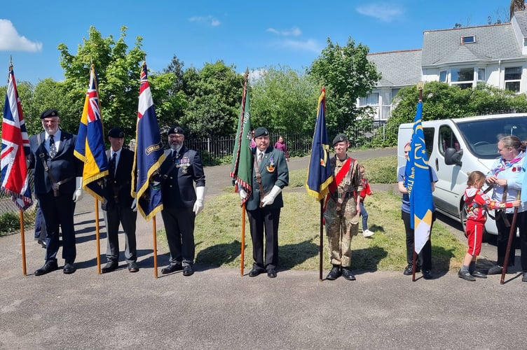 Seven standards on parade representing local organisations and veterans’ groups in Liskeard