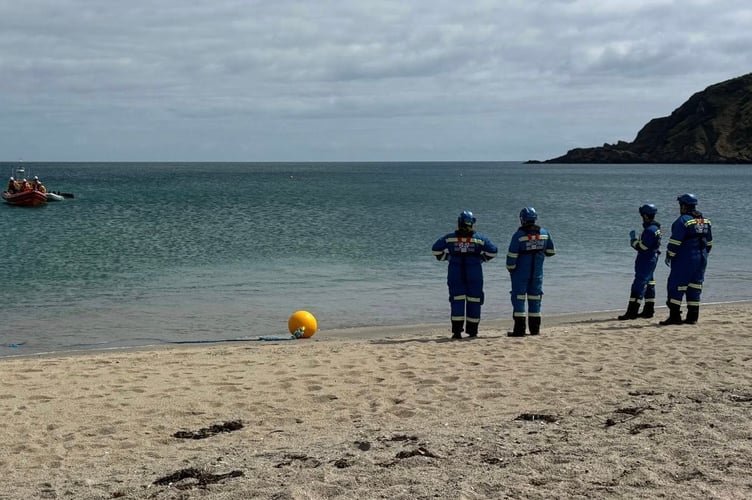 Rescue crews at Pentewan Beach.