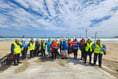 Volunteers clear litter from beach