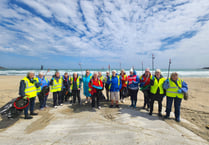 Volunteers clear litter from beach