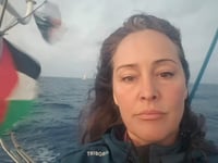 Defiant aid worker on her way to deliver humanitarian aid 