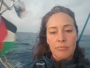 Defiant aid worker on her way to deliver humanitarian aid 