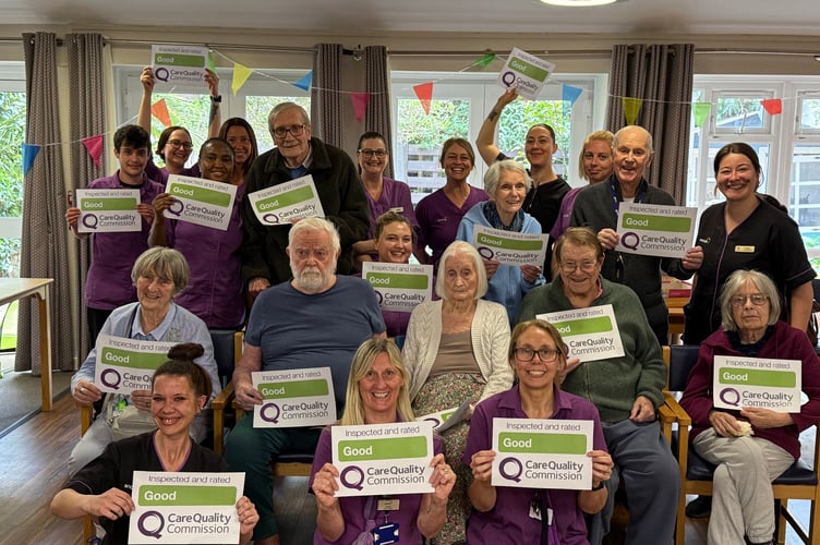 Staff and residents celebrate the good rating