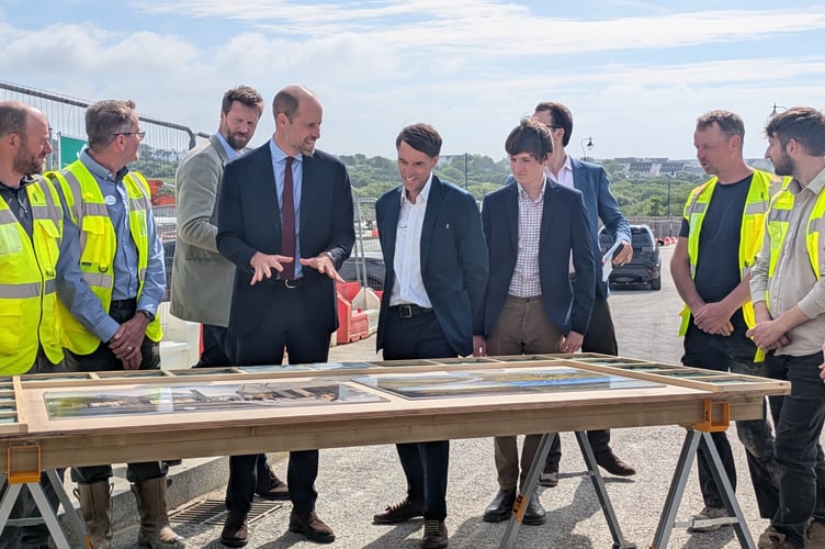 Prince William being shown the plans for Market Street (Picture: Warren Wilkins)
