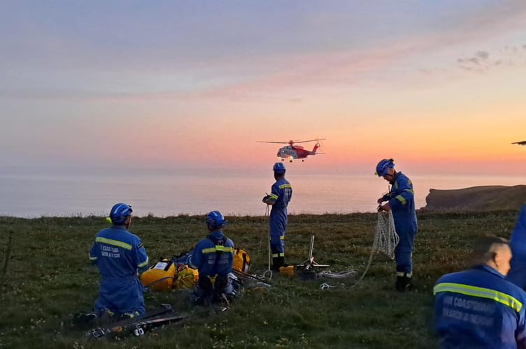 A winch rescue via Rescue helicopter 924 was not possible due to their location combined with loose rock and slate (Picture: Newquay Coastguard Search and Rescue Team)