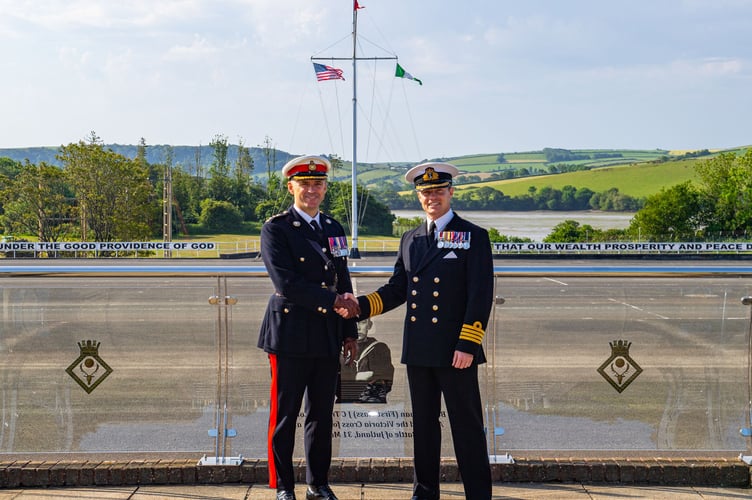 Colonel Chris Hall MBE RM (left) has taken over command of HMS Raleigh in Torpoint from Captain Jeremy Ussher RN (Picture: Royal Navy)
