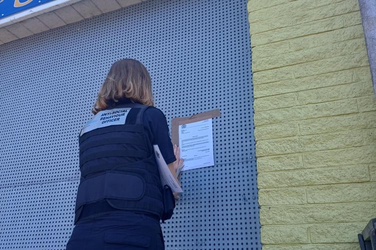 The closure order notice being erected