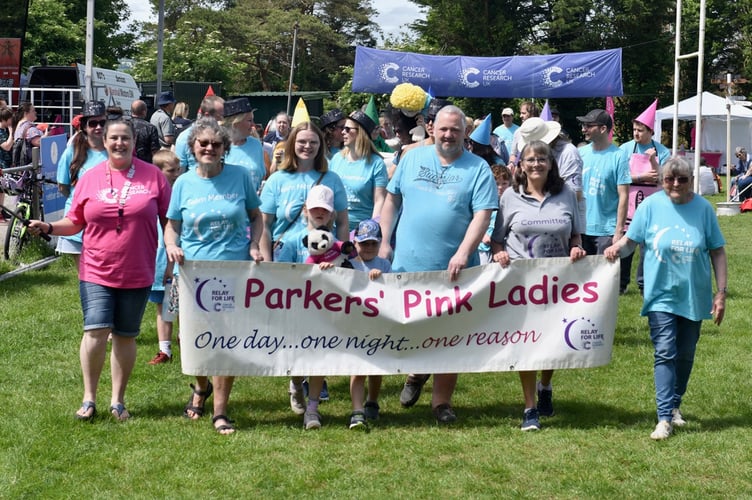 Parkers' Pink Ladies are all smiles as they take part in the Liskeard event raising vital funds for Cancer Research 