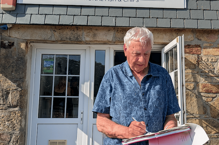 Crantock resident Paul Smith signing the petition at the campaign launch (Picture: Warren Wilkins)
