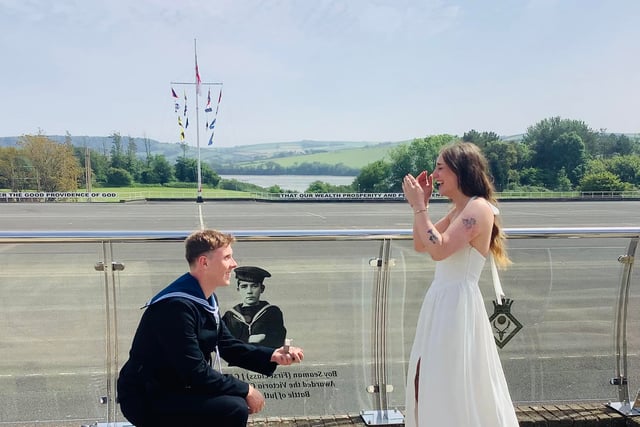 Pass out parade ends with surprise proposal at naval base