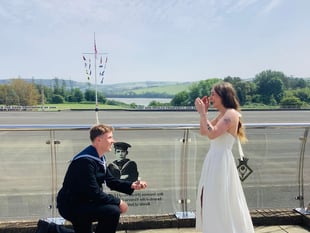 Pass out parade ends with surprise proposal at naval base