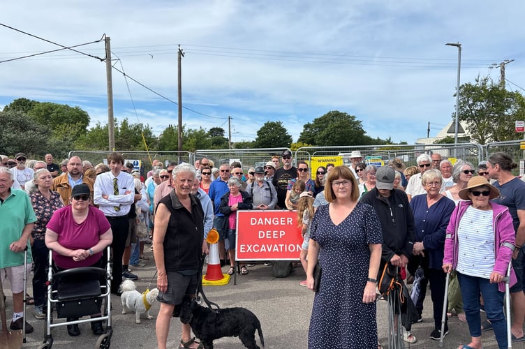 More than 100 residents in Troon protested next to a road closure caused by the sudden appearance of a hole (Pic: Lee Trewhela / LDRS)