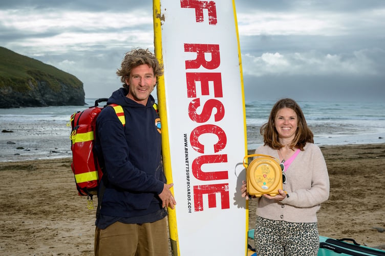 Peter Abell from the Mawgan Porth Surf Life Saving Club and Louise Dale from Classic Cottages with the training defibrillator