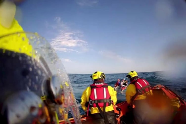 A picture taken by Fowey RNLI of the rescue of Dr Philip Coates.