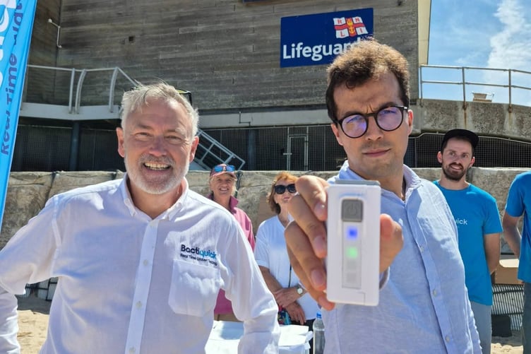 MP Noah Law on the right with one of the water testing kits
