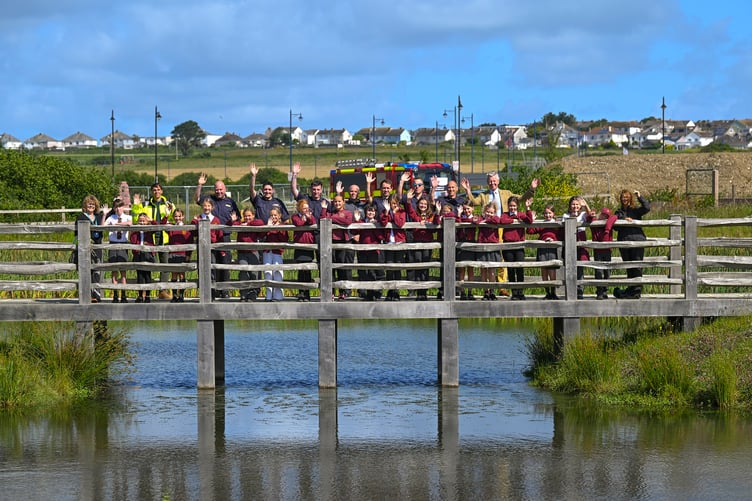 NANSLEDAN, CORNWALL : 08 June 2026. Water safety posters at the SUDS ponds, created by pupils at Nansledan Skol. Photographed for The Duchy of Cornwall by Hugh Hastings.