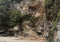 People warned not to sit near cliffs as beach-goers in Cornwall have narrow escape