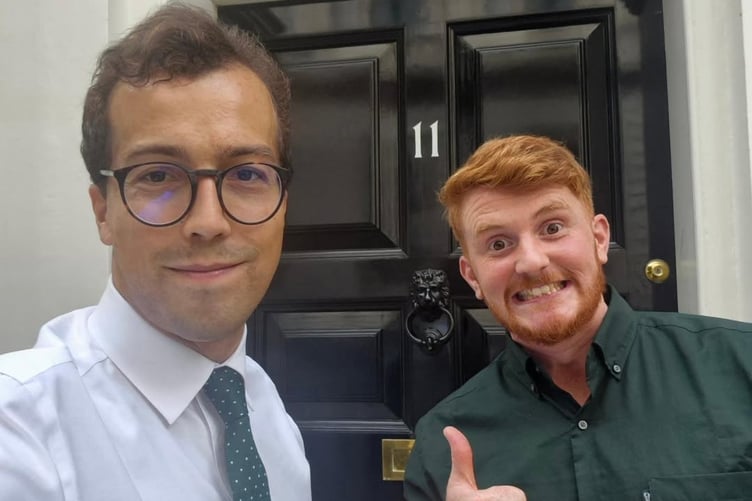 Topher on the left with Newquay and St Austell MP Noah Law outside 11, Downing Street