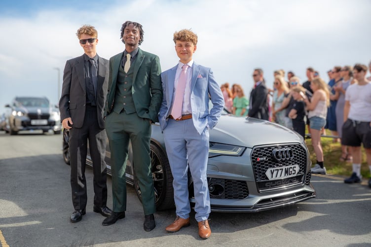 Students arrived in style in various luxury vehicles