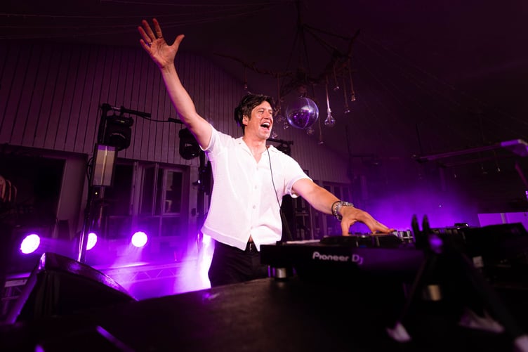 Vernon Kay performing at Lusty Glaze Beach