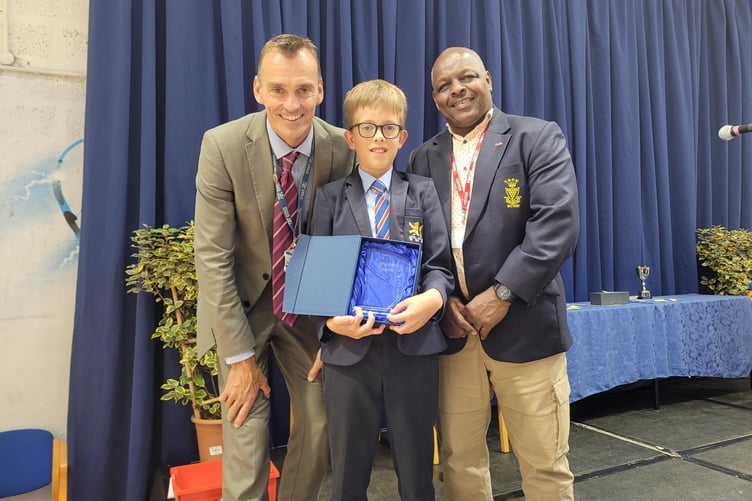 Elliott Wills (centre) with Penair School headmaster James Davidson (left) and Floyd Steadman OBE (right)