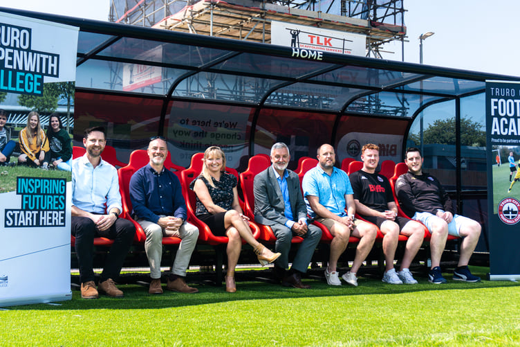 Truro and Penwith College Principal Carl Riding (centre) with representatives from Truro City FC