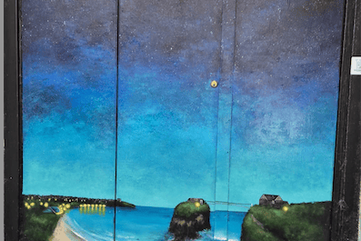 Diane Griffiths Island After Dark painting of a night scene inspired by Newquay’s coastline at the EE shop in Bank Street was targeted