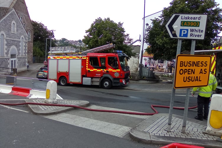 A fire engine at the scene in the centre of St Austell.