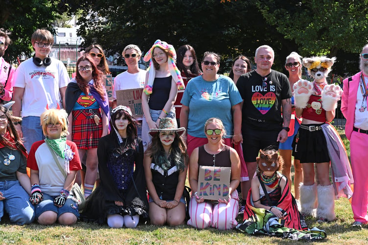 People urged others to 'be kind' as they came together to march through Truro in solidarity for the LGBTQ+ community