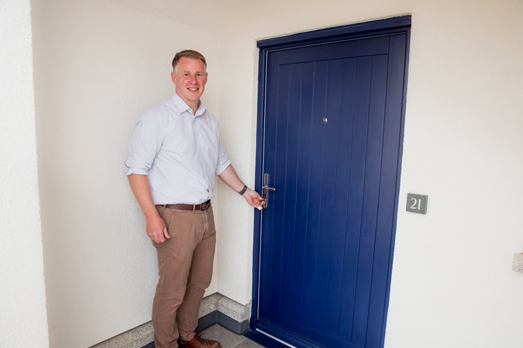 Chief executive of St Petrocs, Henry Meacock, has received the keys to the new homes