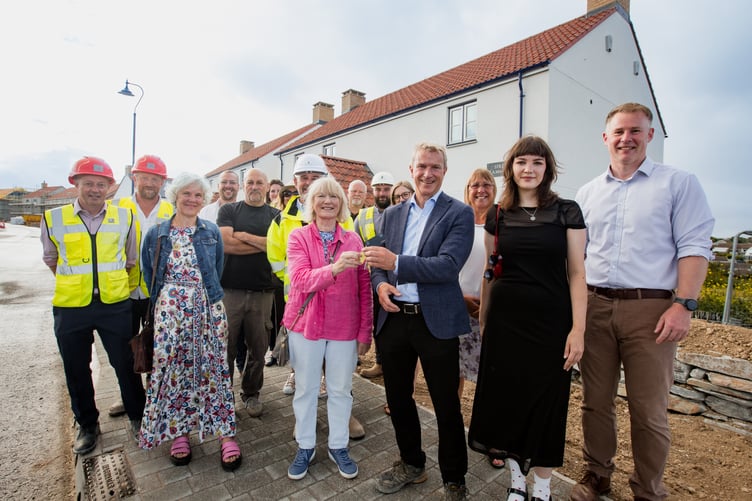 Philip Fry of CG Fry & Son, Margie Ricardo of St Petrocs, Peter James of the Duchy of Cornwall, Henry Meacock of St Petrocs, with other representatives of the organisations during the handover