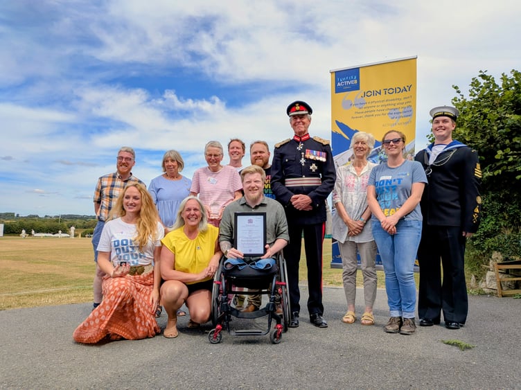 The Active8 team accept the Kings Award for Voluntary Service from the Lord-Lieutenant of Cornwall