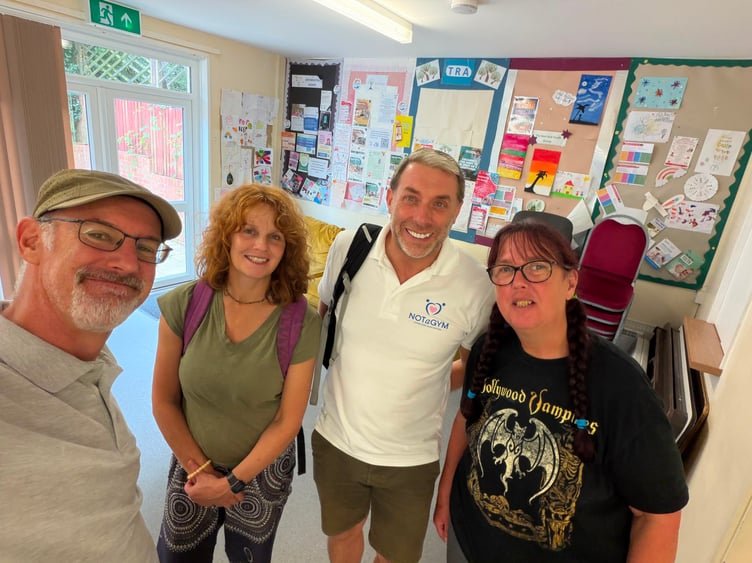 Not a Gym alongside partners Kinsman and Treningle Residents Association at the Kinsman Community Hub, Bodmin; and two different sized Not a Gym CIC logos.