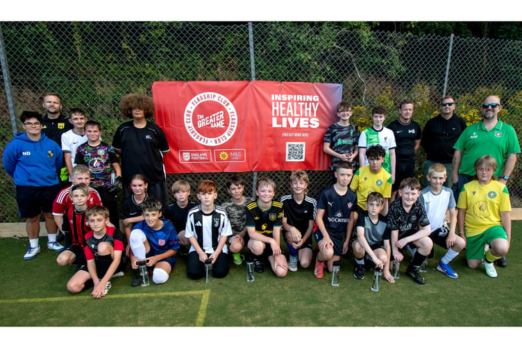 Players and coaches of Mevagissey Youth Football Club are part of The Greater Game initiative. (Picture: Paul Williams).