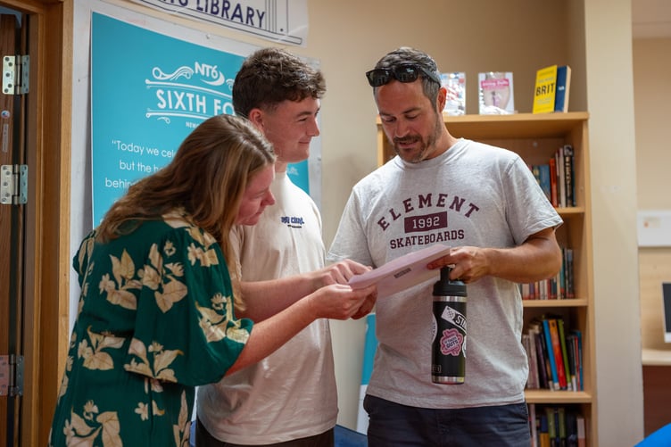 Proud parents accompanied their children, eager to see their results