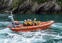 Looe RNLI races to aid paddleboarders