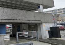 Arrest after man discovered deceased in car park
