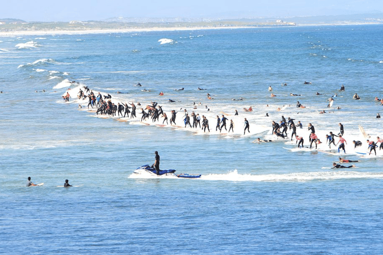 The official Guiness World Record the most surfers riding the same wave simultaneously is 110 (Picture: AVG)
