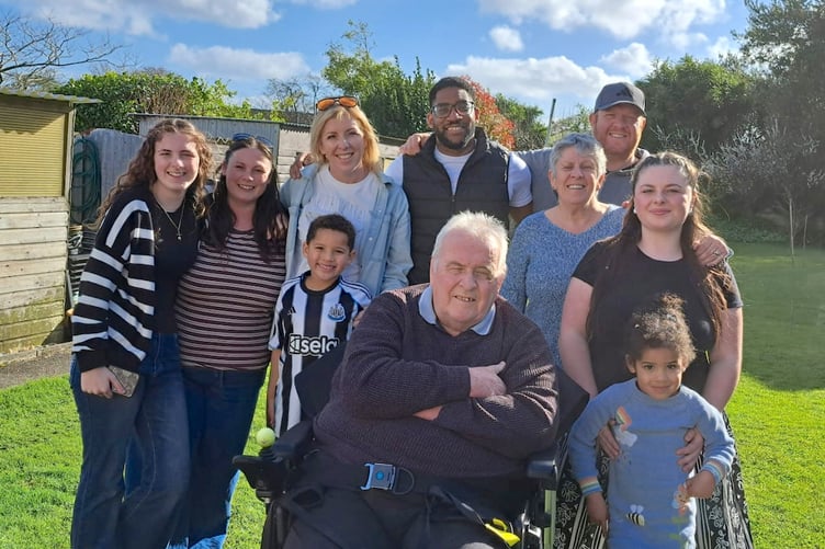 Michael Ford, who has written the book, with members of his family.