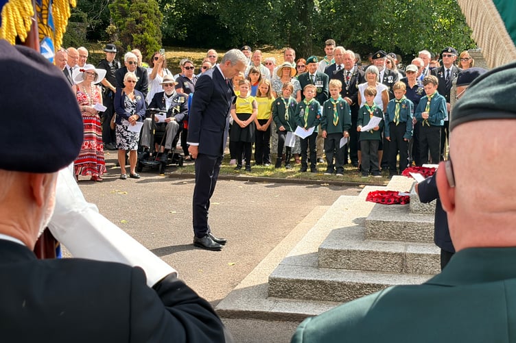 Rear Admiral John Weale, CB OBE RN, pays his respects at the Liskeard war memorial