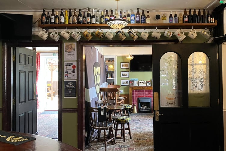 Looking from the bar at the New Inn through to a sitting area.