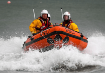 Lifeboats launched to save missing swimmer
