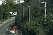 The silver Audi on fire