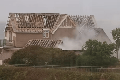 Smoke billowing from Skerryvore House following the alleged arson attack