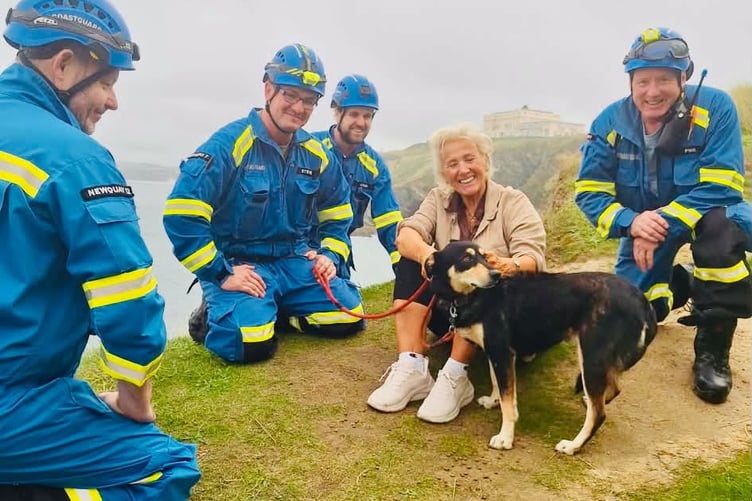 Members of Newquay Coastguard Search and Rescue Team reunite Pip with its owner Diane (Picture: Newquay Coastguard)