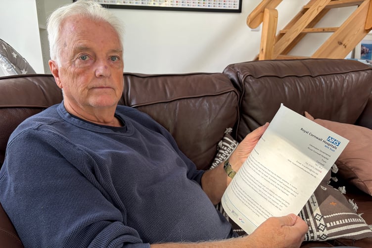 Peter Hall with the letter from the Royal Cornwall Hospitals Trust revealing Michaela's medical records had been accessed by staff without permission