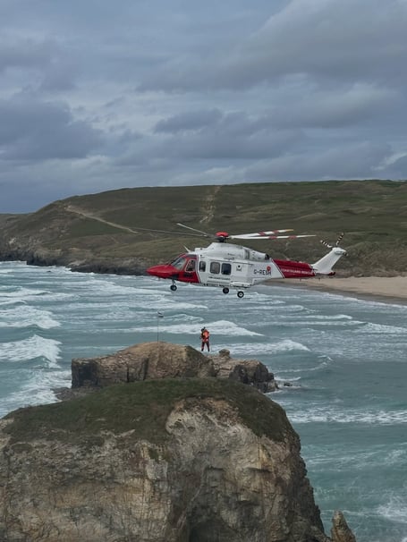 Coastguard Rescue Helicopter 387 based at St Athan winched the casualty to safety (Picture: Newquay Coastguard Search and Rescue Team)