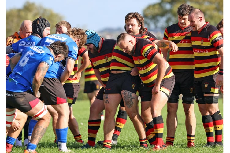Saltash's pack prepare for a scrum.