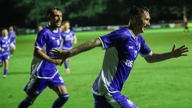 Jack Crago celebrates one of his two goals with fellow sharp-shooter James Lorenz not far behind.