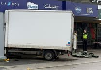 Driver in his 50s dies after vehicle crashes into Redruth shop